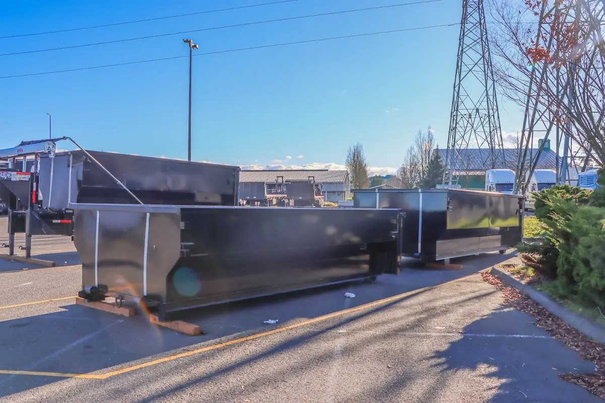 Roll-off dumpster ready for waste disposal at job site for 2 Yard Dumpster Rental in Thompson's Station